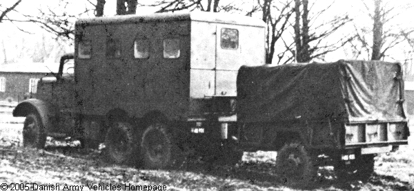 Mack NM, 6 x 6, 6/12V (Rear view, left side)